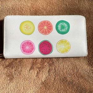 Zip around wallet color white.